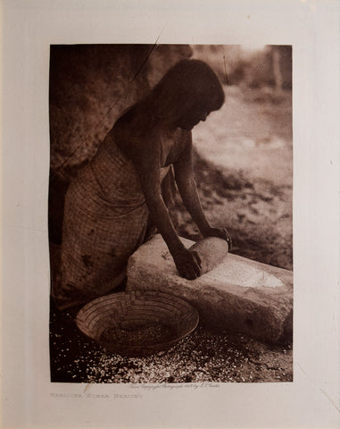 Edward S. Curtis  (1868-1952),  Maricopa Woman Mealing, Page 82